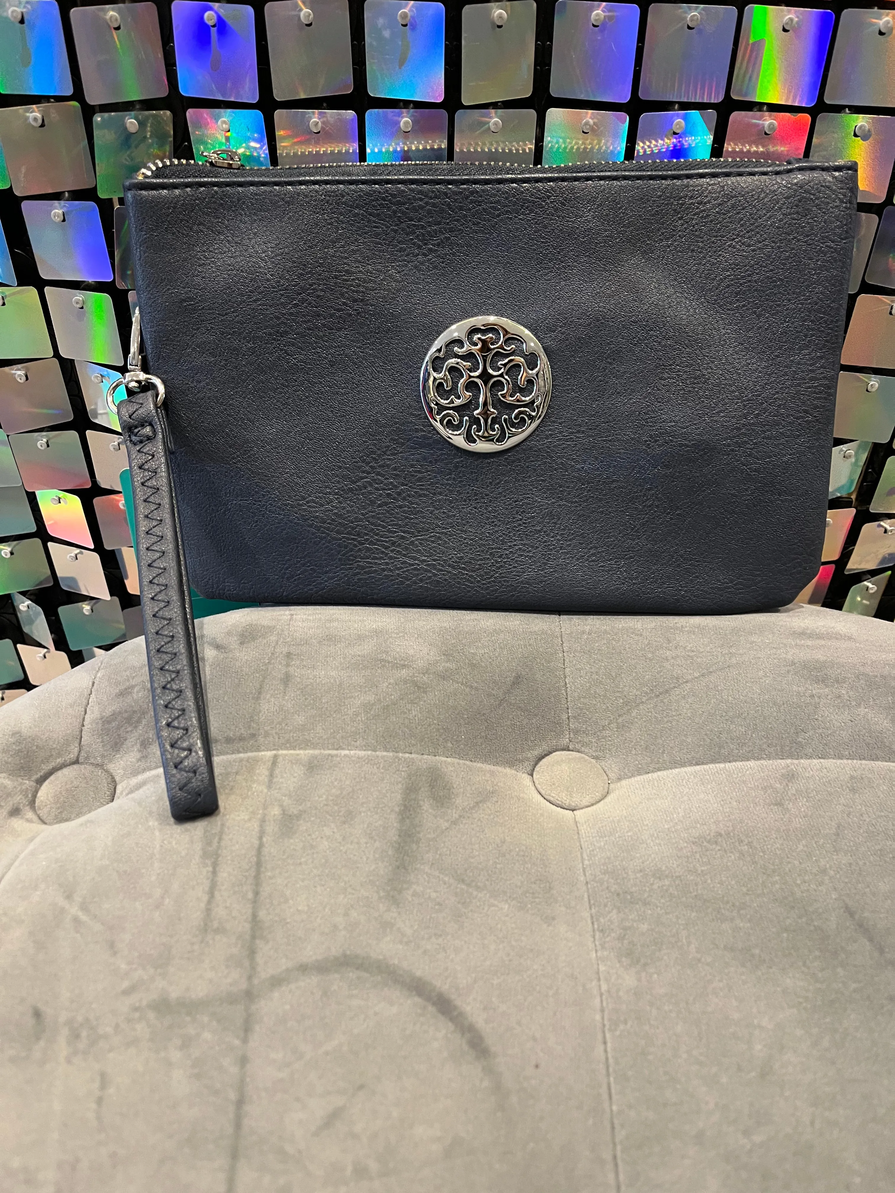 Clutch bag with cross body strap