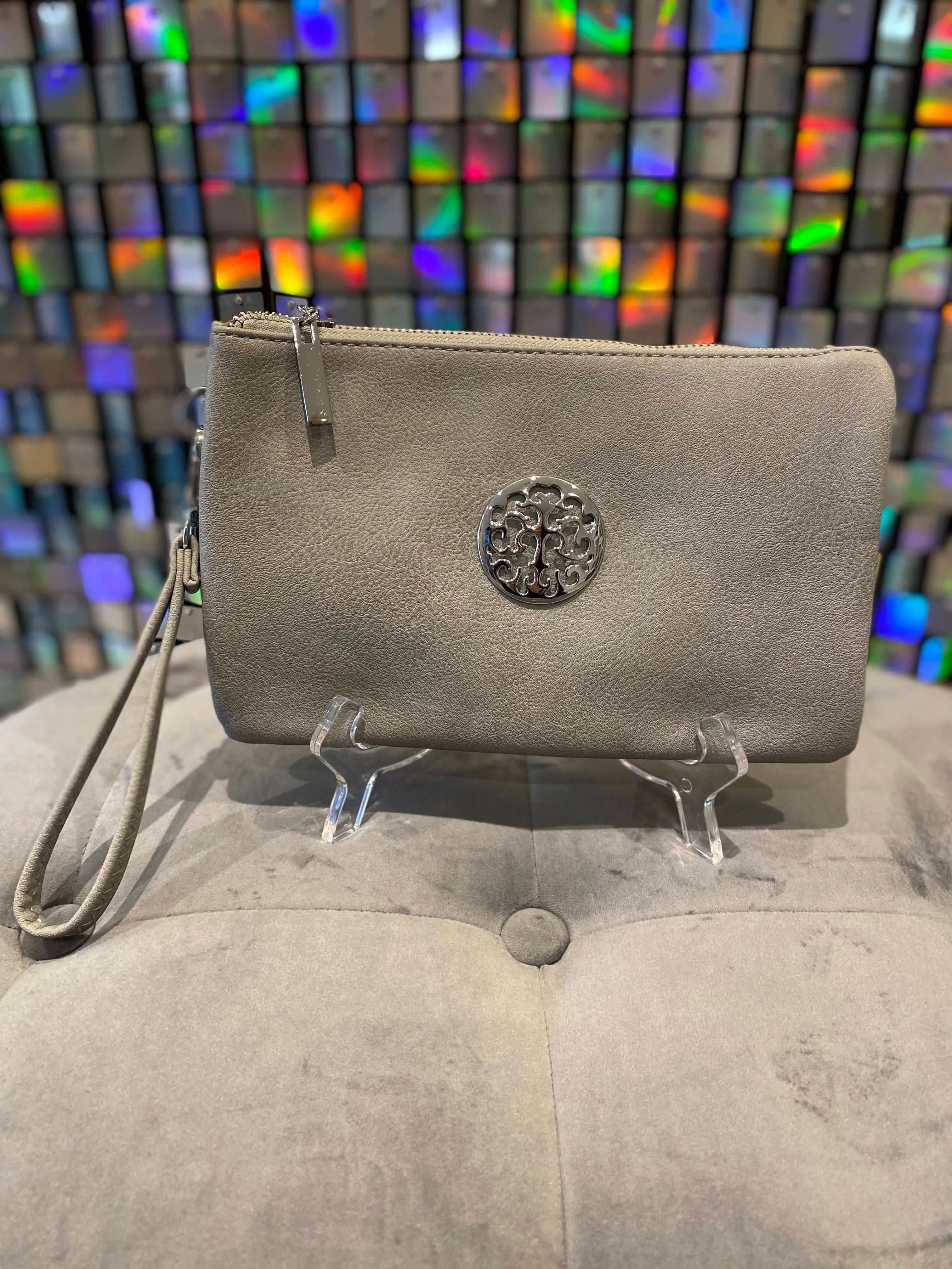 Clutch bag with cross body strap