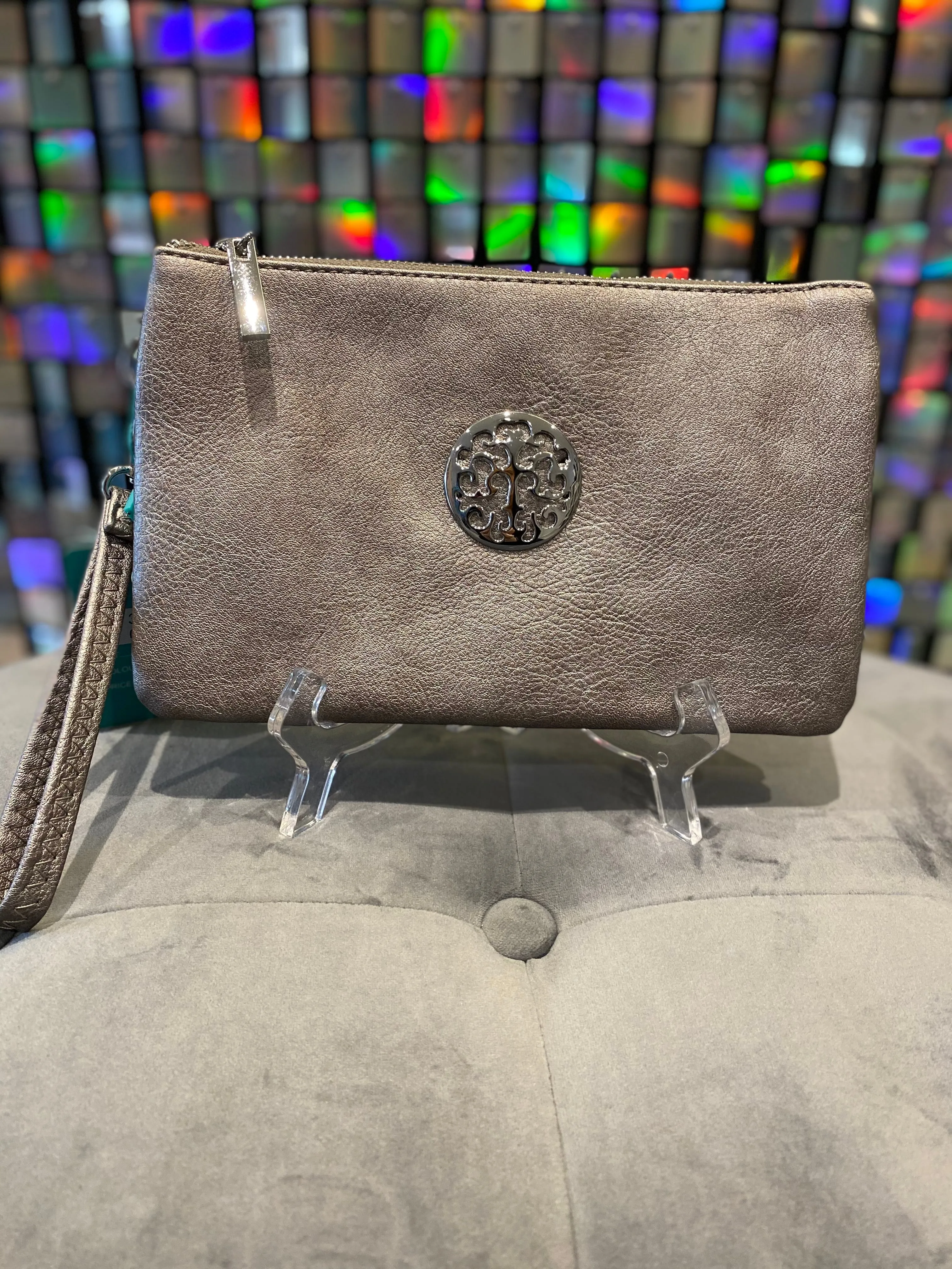 Clutch bag with cross body strap