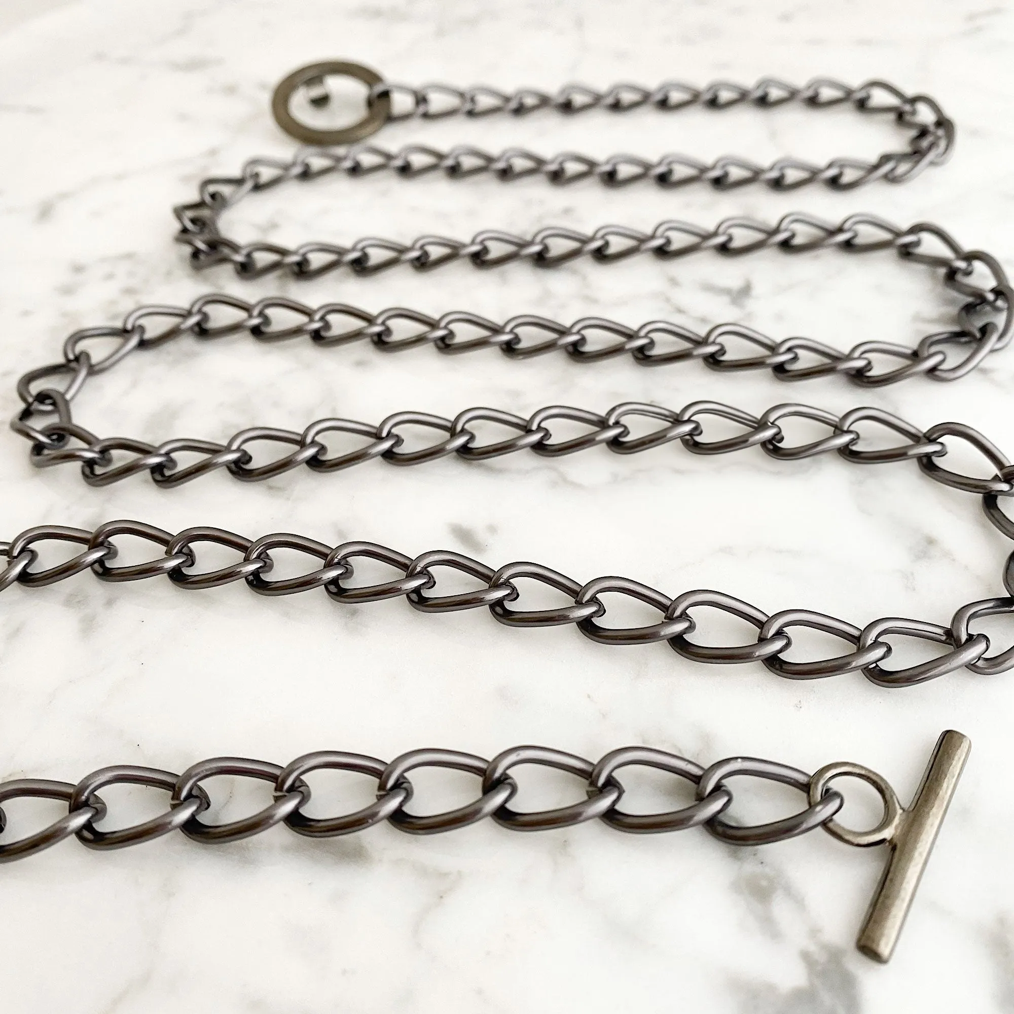 MARIBETH gun metal chain belt